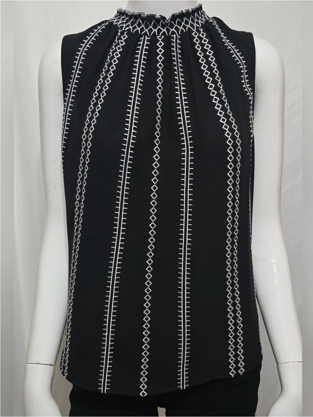 WHBM Black Sleeveless Embroidered Mock-Neck blouse